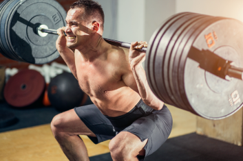 Osiągnięcia w podnoszeniu ciężarów a kinezjologia stosowana